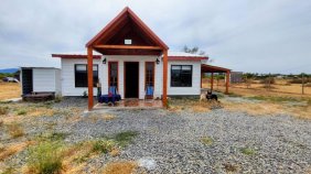 Parcela con casa amoblada y 5.000 m² de terreno en venta